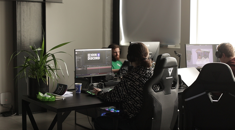 VSQUAD production team working on game art and development support