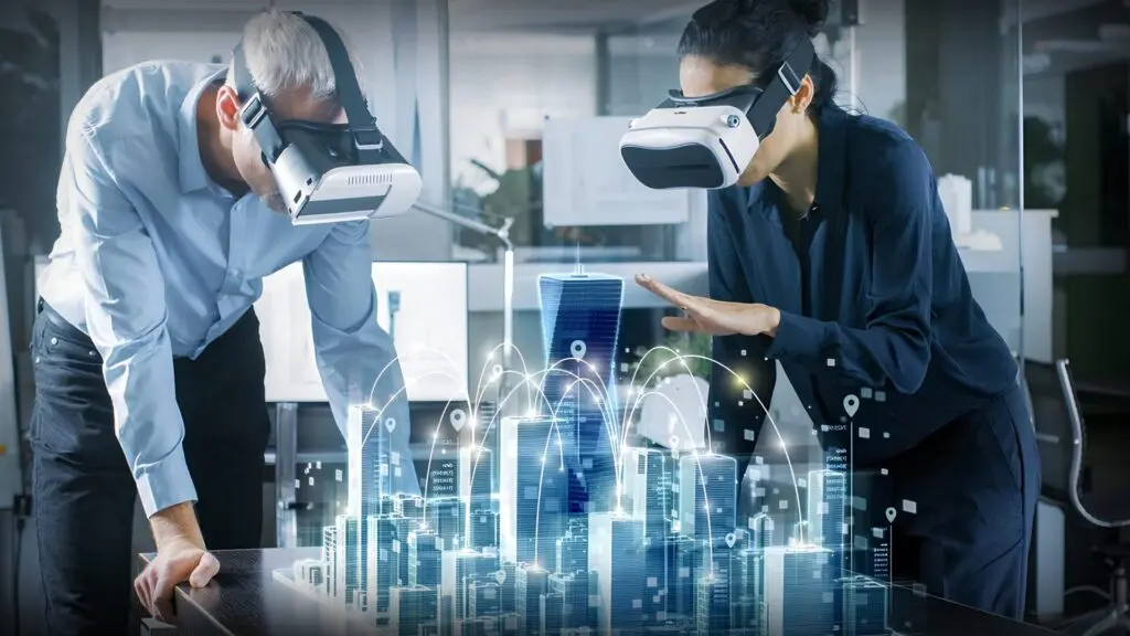 Virtual reality experience with two professionals wearing VR headsets and interacting with a holographic 3D city model